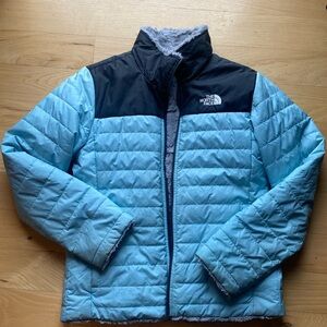 Light teal cozy North Face girls jacket